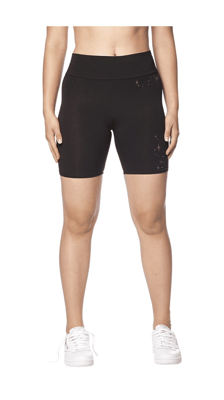Athletic black shorts with white sneakers