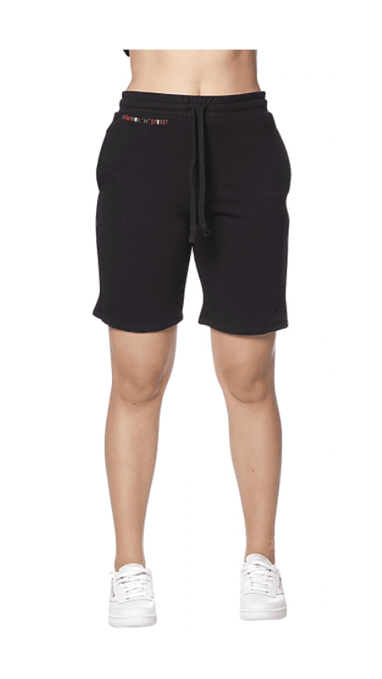 Athletic black shorts and white sneakers